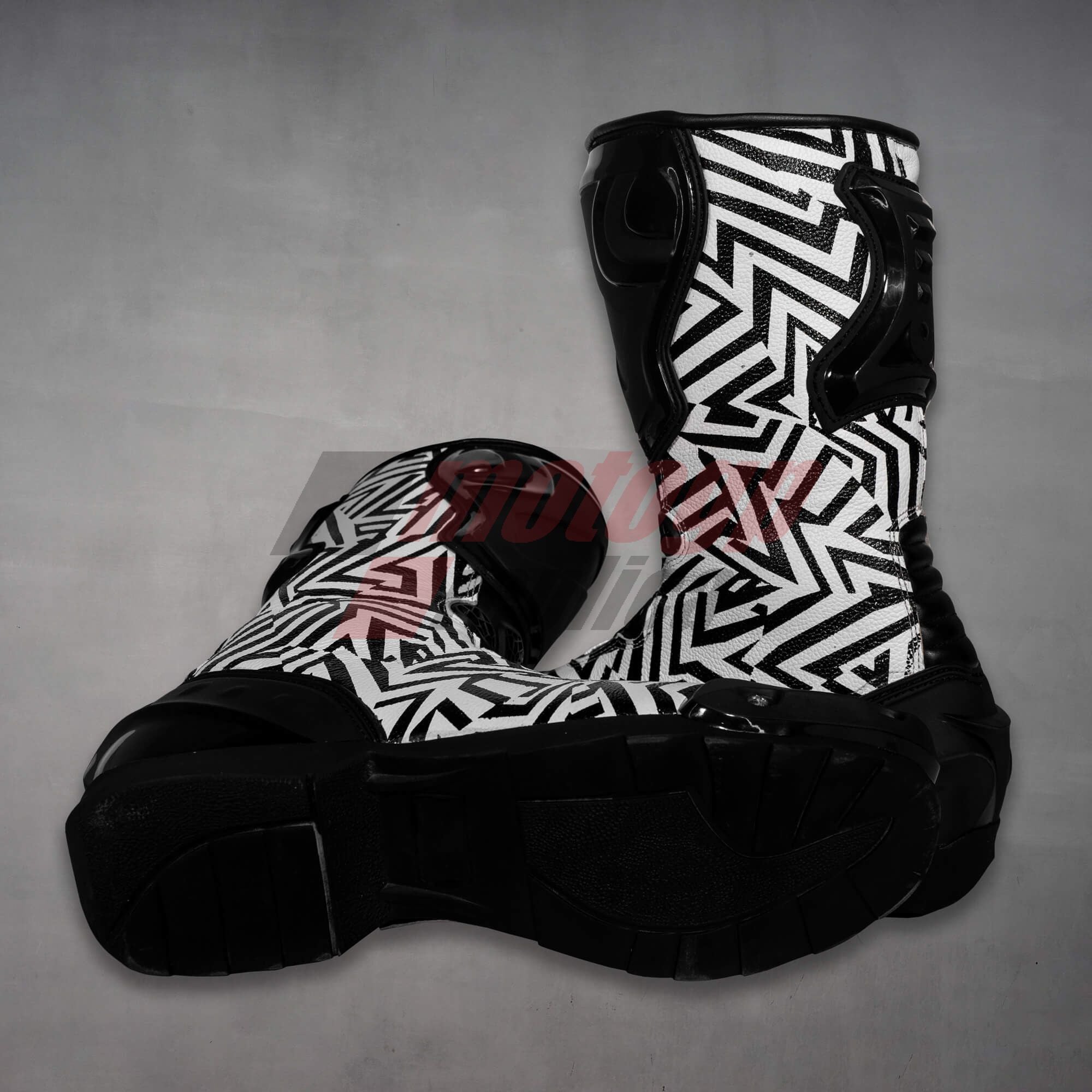 black and white motorcycle boot